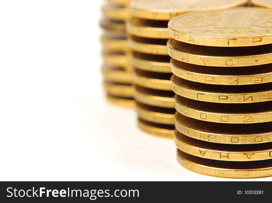 The stack of coins isolated on white