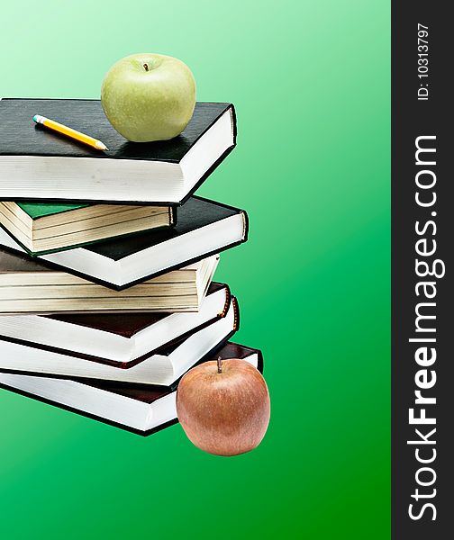 Green Apple And Pencil On Books