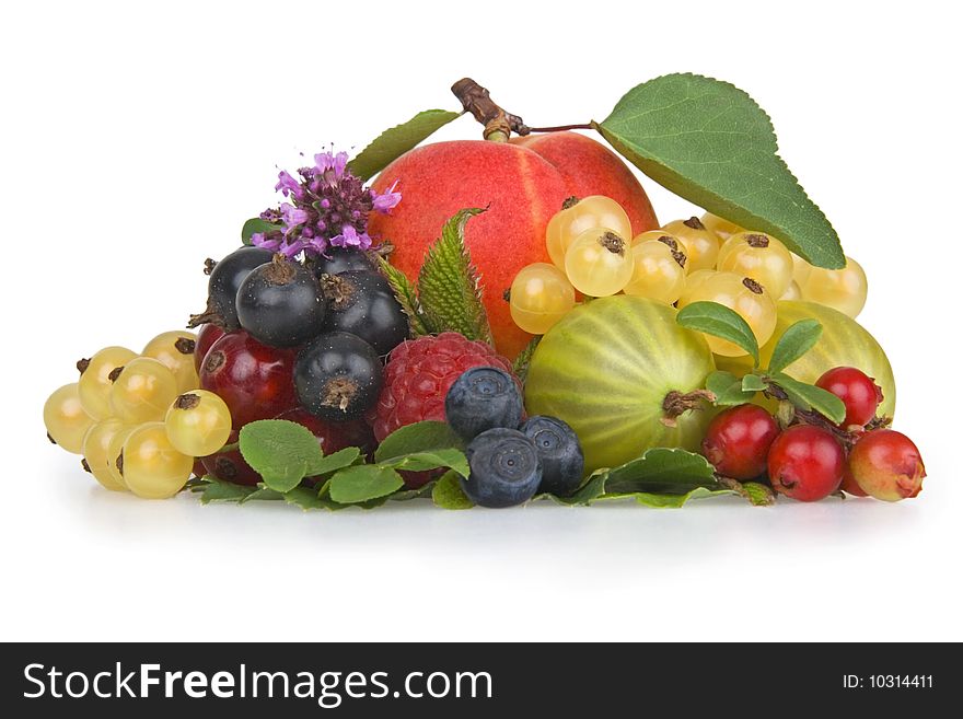 Variety of fresh colorful fruits.On white.