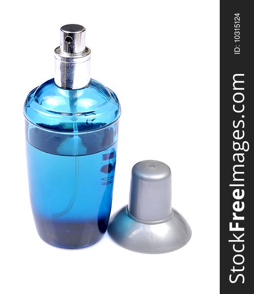 Blue perfume bottle isolated on white background.