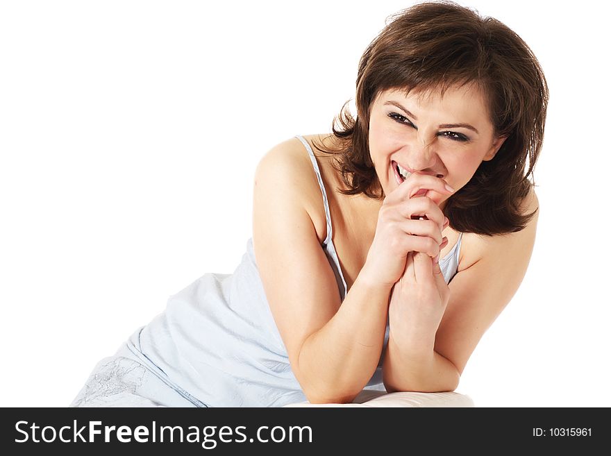 Laughing young woman with brown curly hair