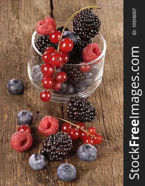 Fresh berries on a wooden table