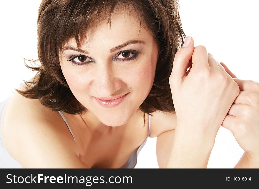 Smiling young woman with brown curly hair. Smiling young woman with brown curly hair