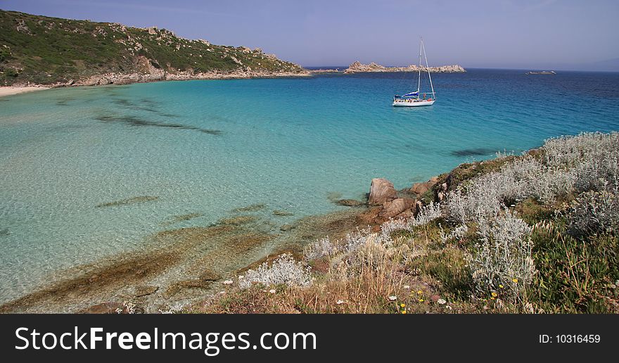 Boat Sails In Turquoise Water