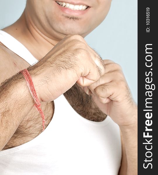 Boy in punching mode posing in studio. Boy in punching mode posing in studio.