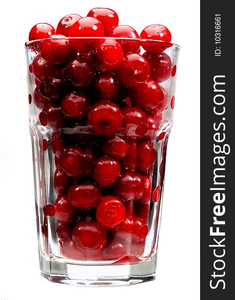 Sweet Cherries In High Glass On White Background