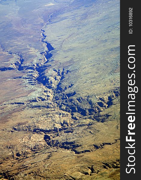 Arid valley in rocky mountains aerial view