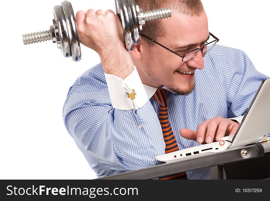 Businessman lifting dumbbell with laptop. Businessman lifting dumbbell with laptop