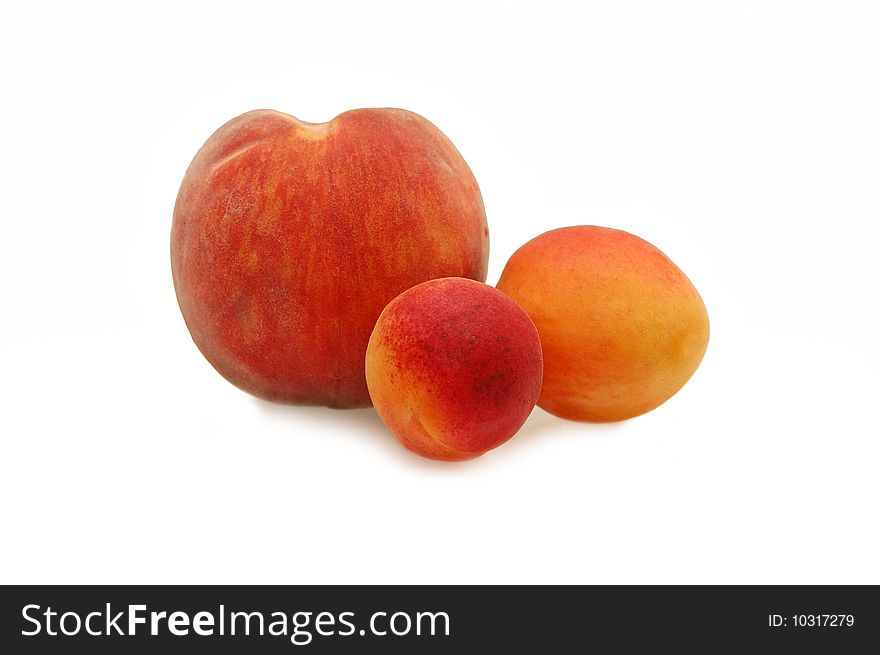 Peach and apricot is photographed on white background