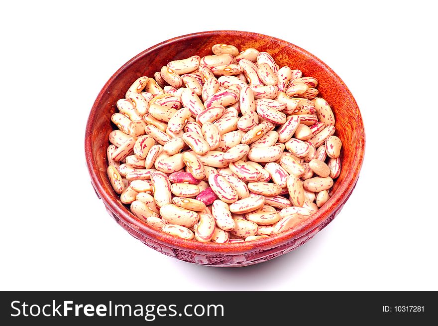 Kidney beans in wooden bowl.