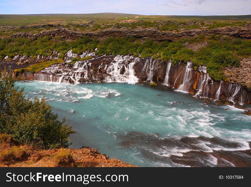 Icelandic spectacular lava field cascade waterfall. Icelandic spectacular lava field cascade waterfall