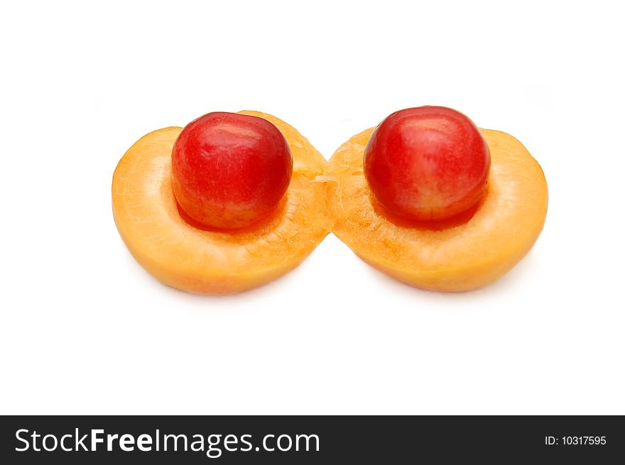 Apricot And Sweet Cherry On A White Background