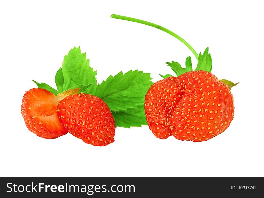 This is a composition of  cut strawberry with leaves