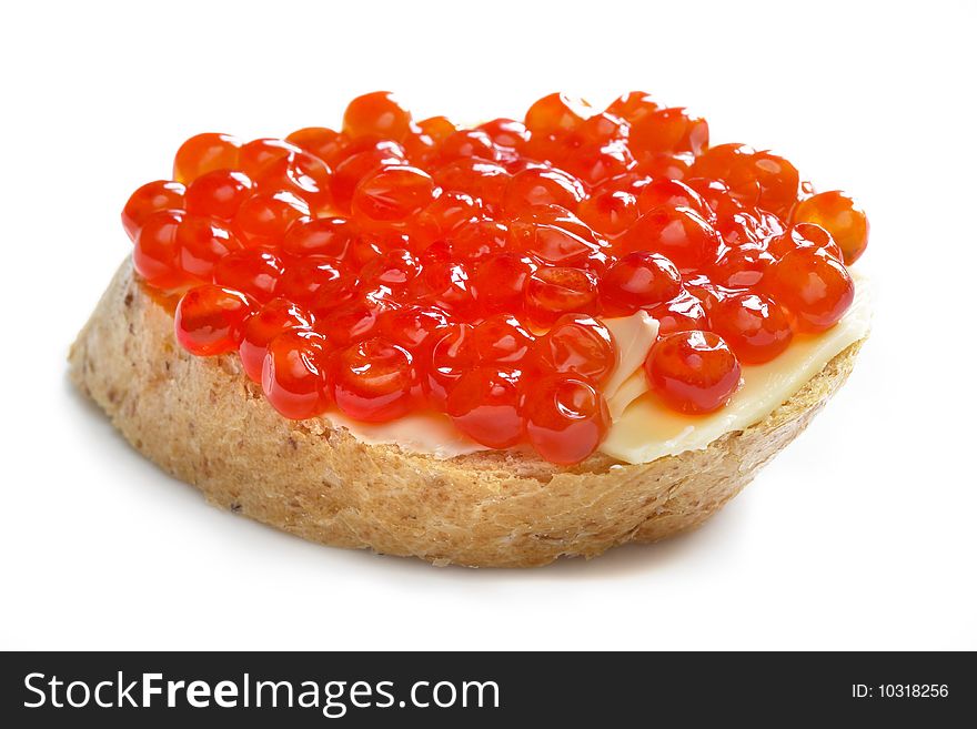 Red caviar with bread and butter isolated over white background. Red caviar with bread and butter isolated over white background