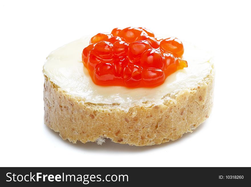 Red caviar with bread and butter isolated over white background. Red caviar with bread and butter isolated over white background