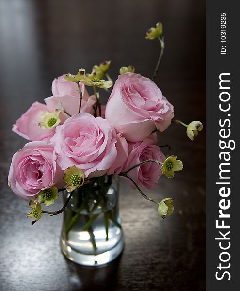 Pink hybrid tea rose bloom flower arrangement