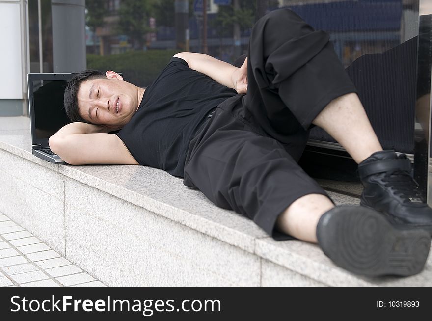 Man sleeping outdoors. Man sleeping outdoors.
