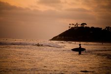 A Surfer At Sunset Royalty Free Stock Images A Surfer At Sunset Royalty Free Stock Images