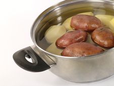 Fresh Raw Potatoes Into The Steel Pan. Royalty Free Stock Photo Fresh Raw Potatoes Into The Steel Pan. Royalty Free Stock Photo