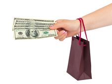 Hand With Money Shopping Bag Royalty Free Stock Photos