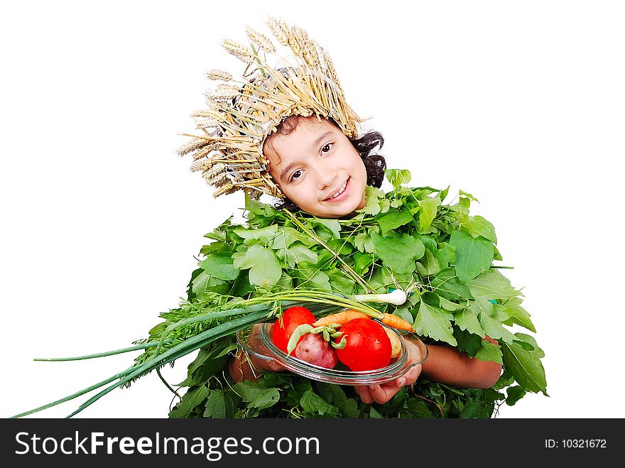 Nice little girl in leafs cloths with wheat hat on head