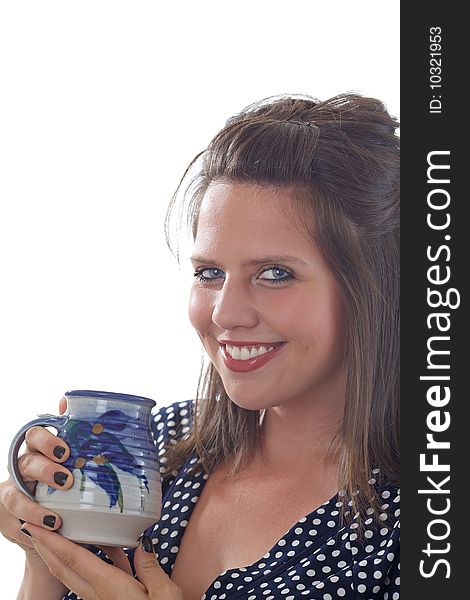 Young smiling business woman holds a coffee cup; close-up isolated on a white background. Young smiling business woman holds a coffee cup; close-up isolated on a white background.