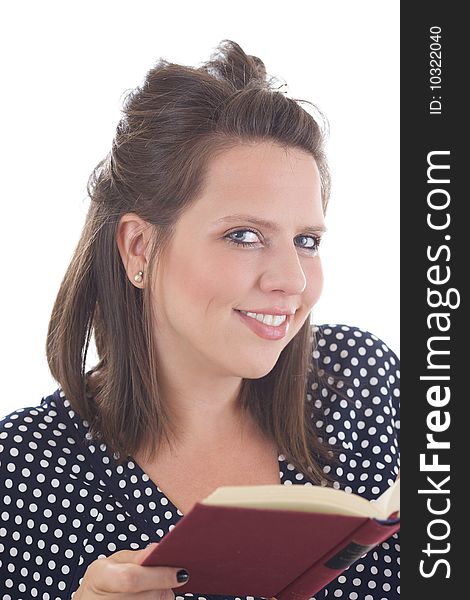 Young business woman looks up from reading a book; isolated on a white background. Young business woman looks up from reading a book; isolated on a white background.