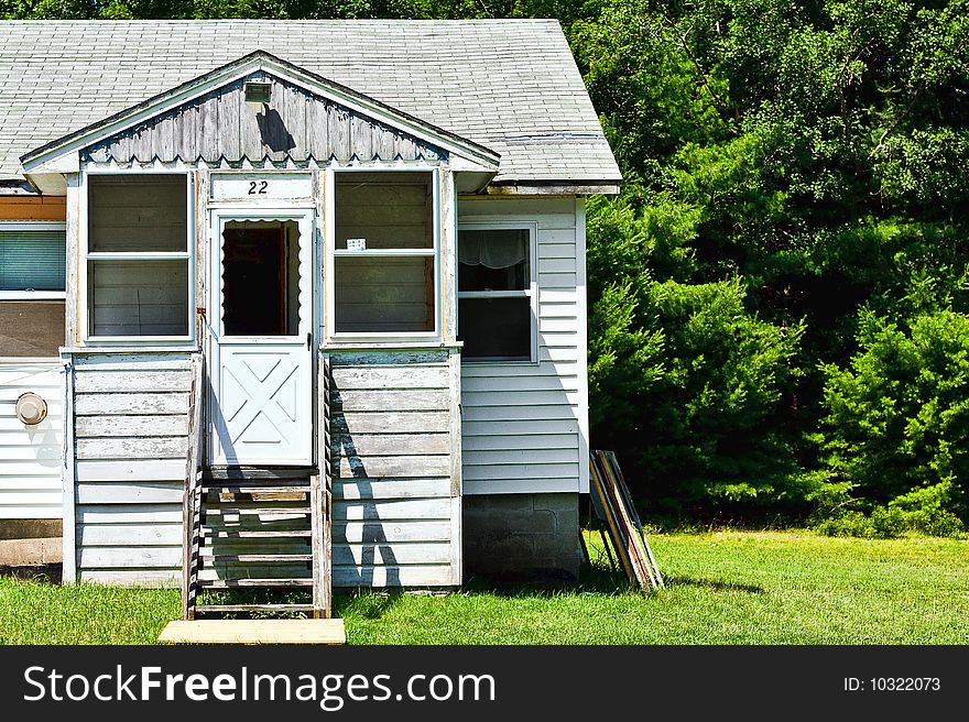 An old bungalow by the edge of the forest. An old bungalow by the edge of the forest