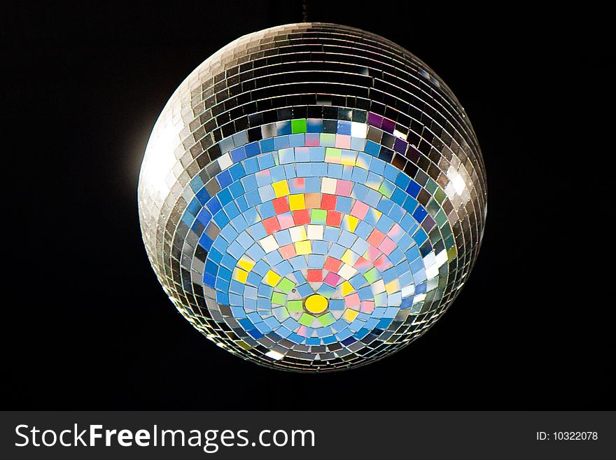 Large disco ball on black background