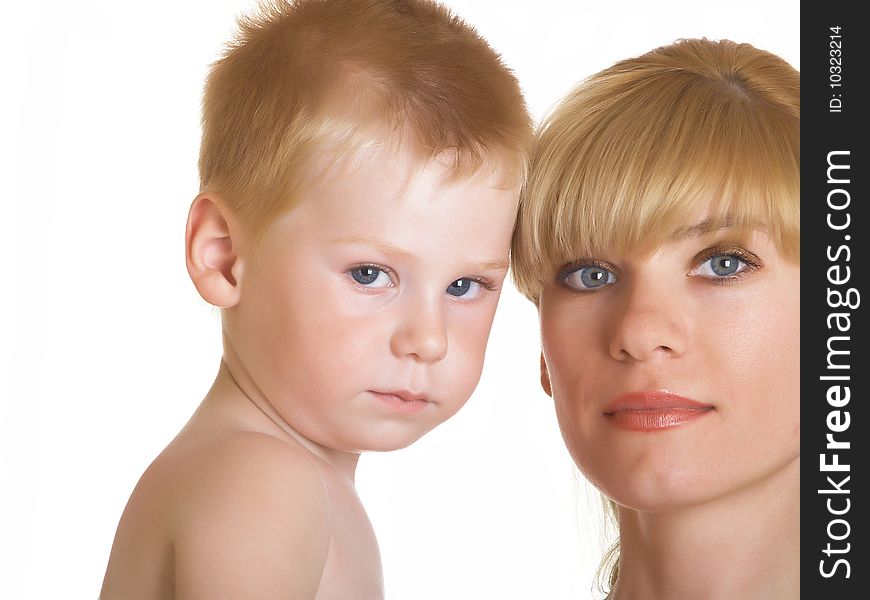 Young mum with the small son on a white background. Young mum with the small son on a white background