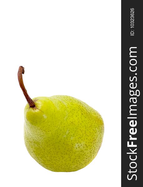 Ripe pear with shank is isolated on white background. Ripe pear with shank is isolated on white background