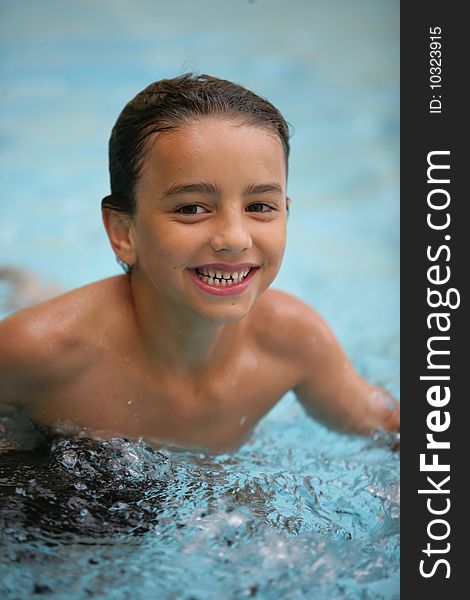 Portrait of happy boy in swimmingpool. Portrait of happy boy in swimmingpool