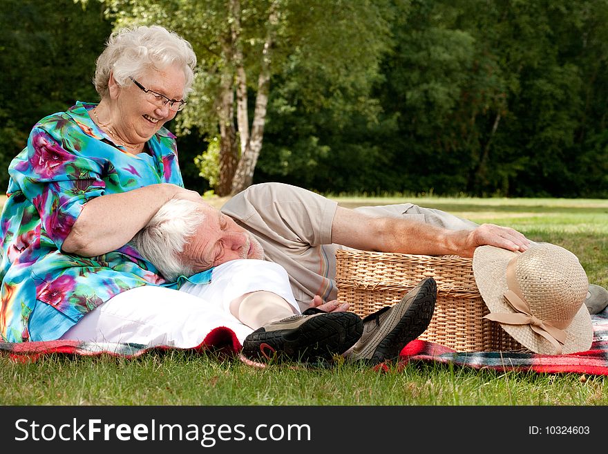 Grandmother Is Tickling Grandfather