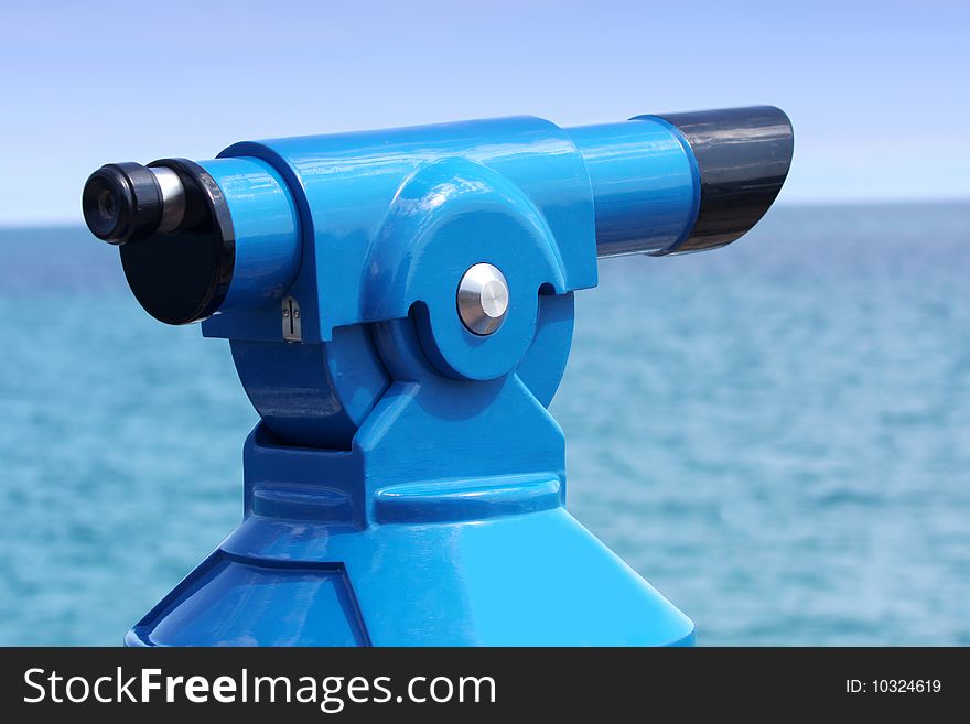 Coin operated binoculars on the pier in Costa Brava, Spain