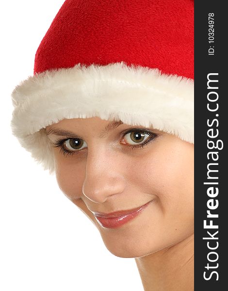 Pretty girl in santa hat over white