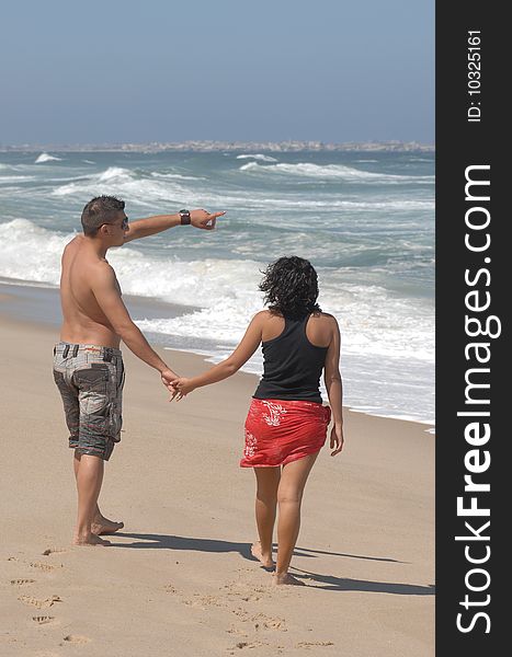 A attractive lovely couple on the beach