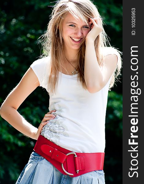 Teenage girl in fresh and happy mood outside in the park. Teenage girl in fresh and happy mood outside in the park