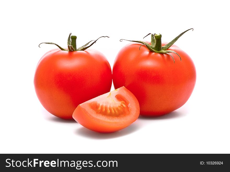 Fresh tomatoes. Macro studio isolated on white.