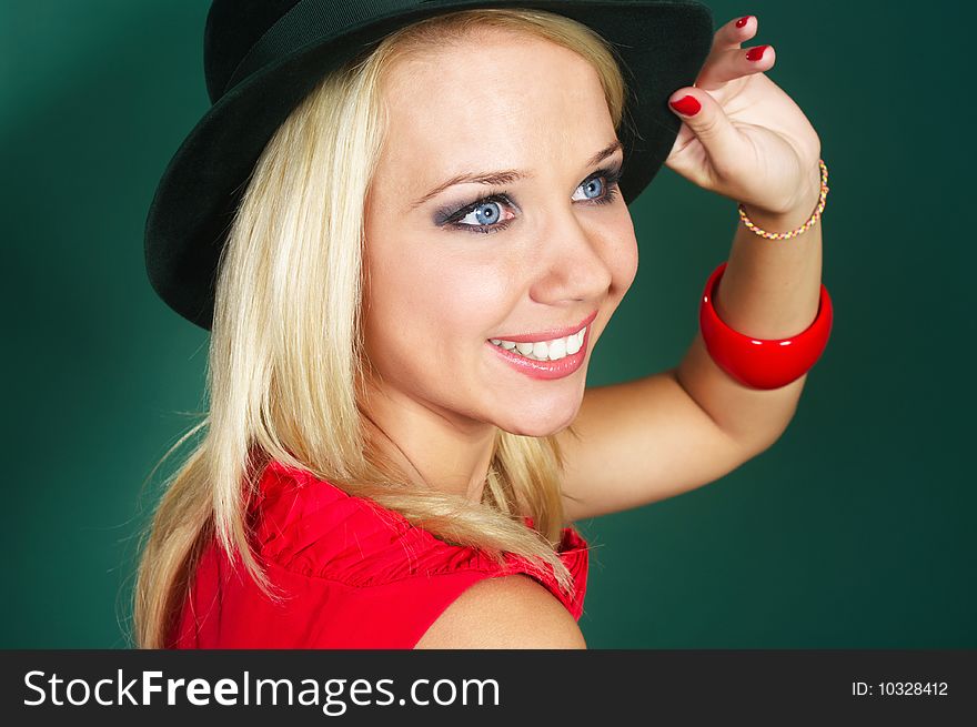 Young woman in green bonnet