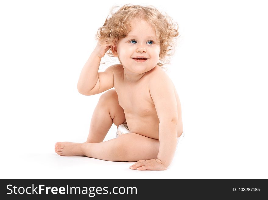 Little girl in a diaper, naked, white background