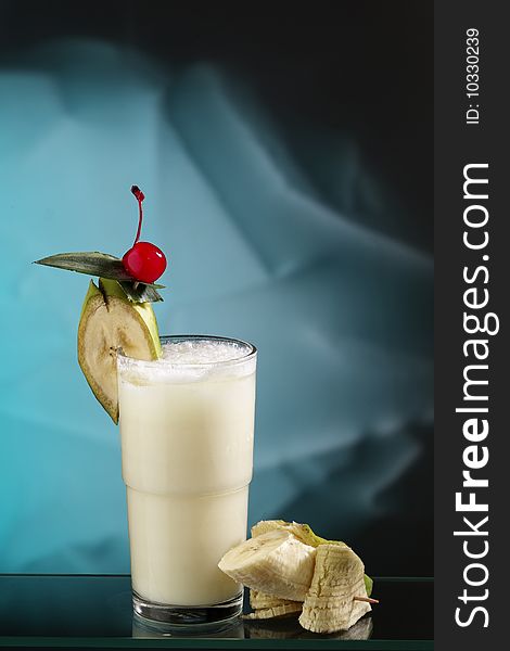 Coconut cocktail with abstract background