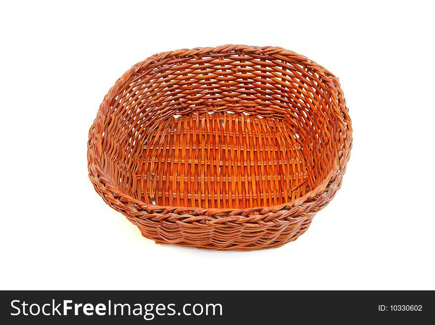 Empty orange wicker basket without handles isolated. Empty orange wicker basket without handles isolated