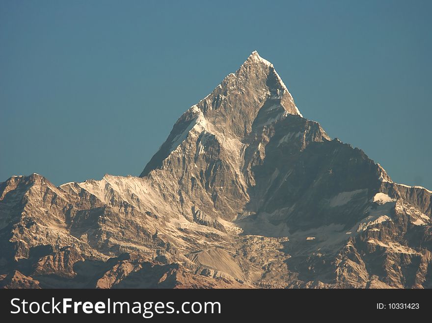 Close up of Machhapuchhre (6997 meters) in the Annapurna range of the Himalayas, taken from Pokhara, Nepal. Close up of Machhapuchhre (6997 meters) in the Annapurna range of the Himalayas, taken from Pokhara, Nepal