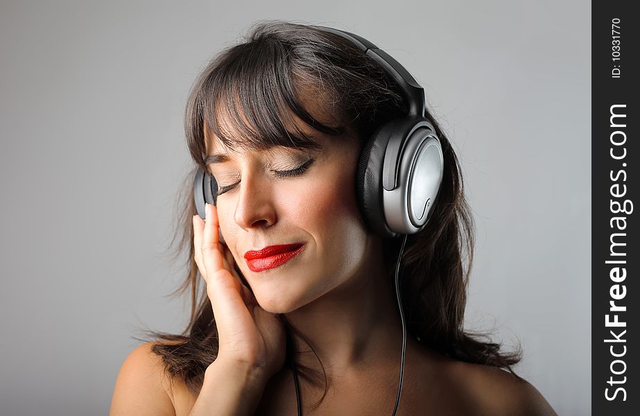 Portrait of beautiful girl with earphones. Portrait of beautiful girl with earphones