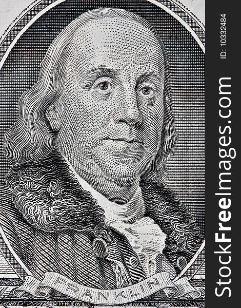 Portrait of Benjamin Franklin from the one hundred dollar bill. This is an old style bill.