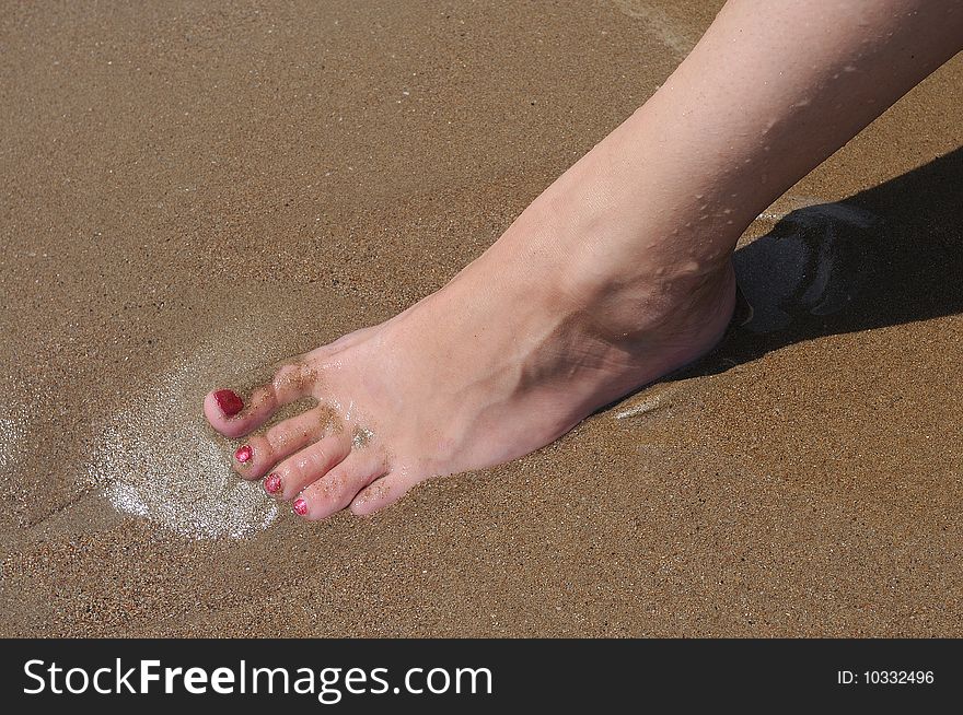 Foot in sand