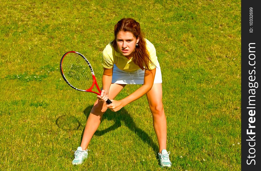 Young sports woman with racket. Young sports woman with racket