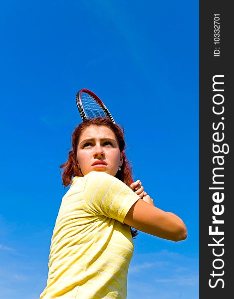 Portrait of young woman with racket. Portrait of young woman with racket