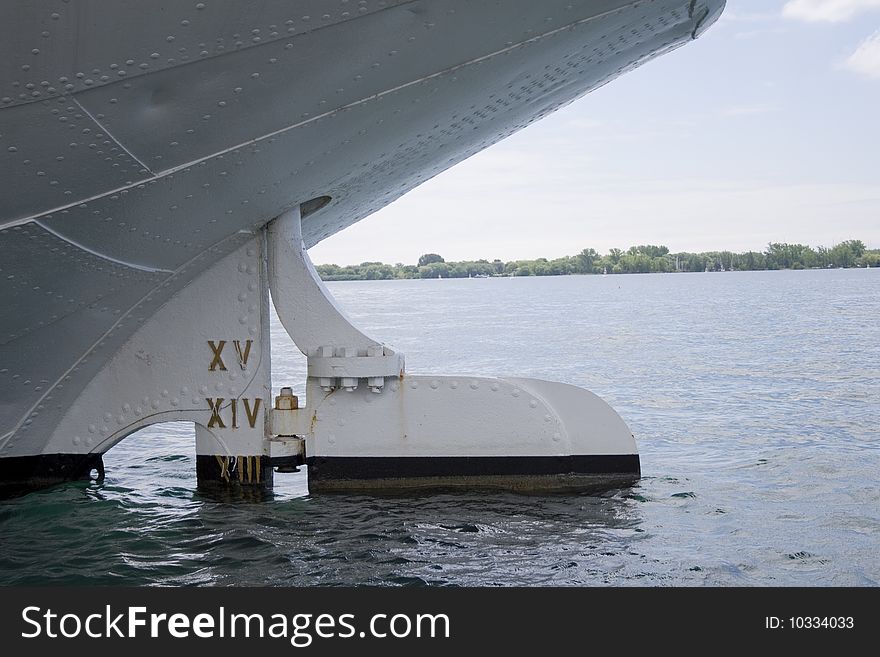 A ships rudder at a dock