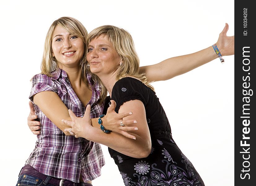 Mother and her teenage daughter hugging